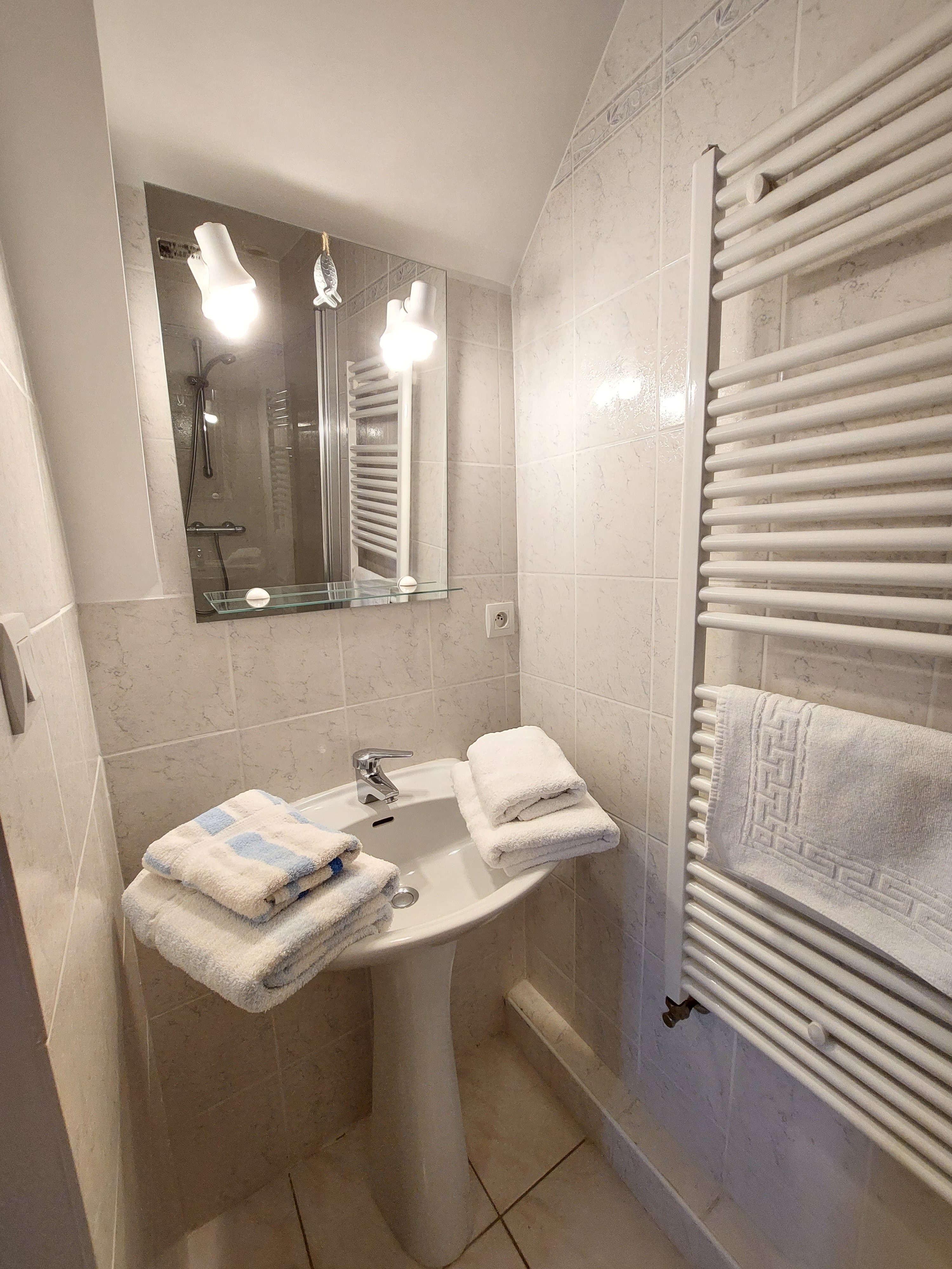 Shower room adjoining bedroom 3