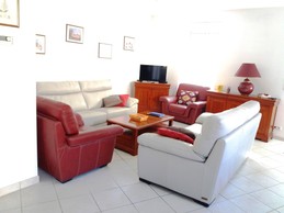 The living room as seen from the kitchen area