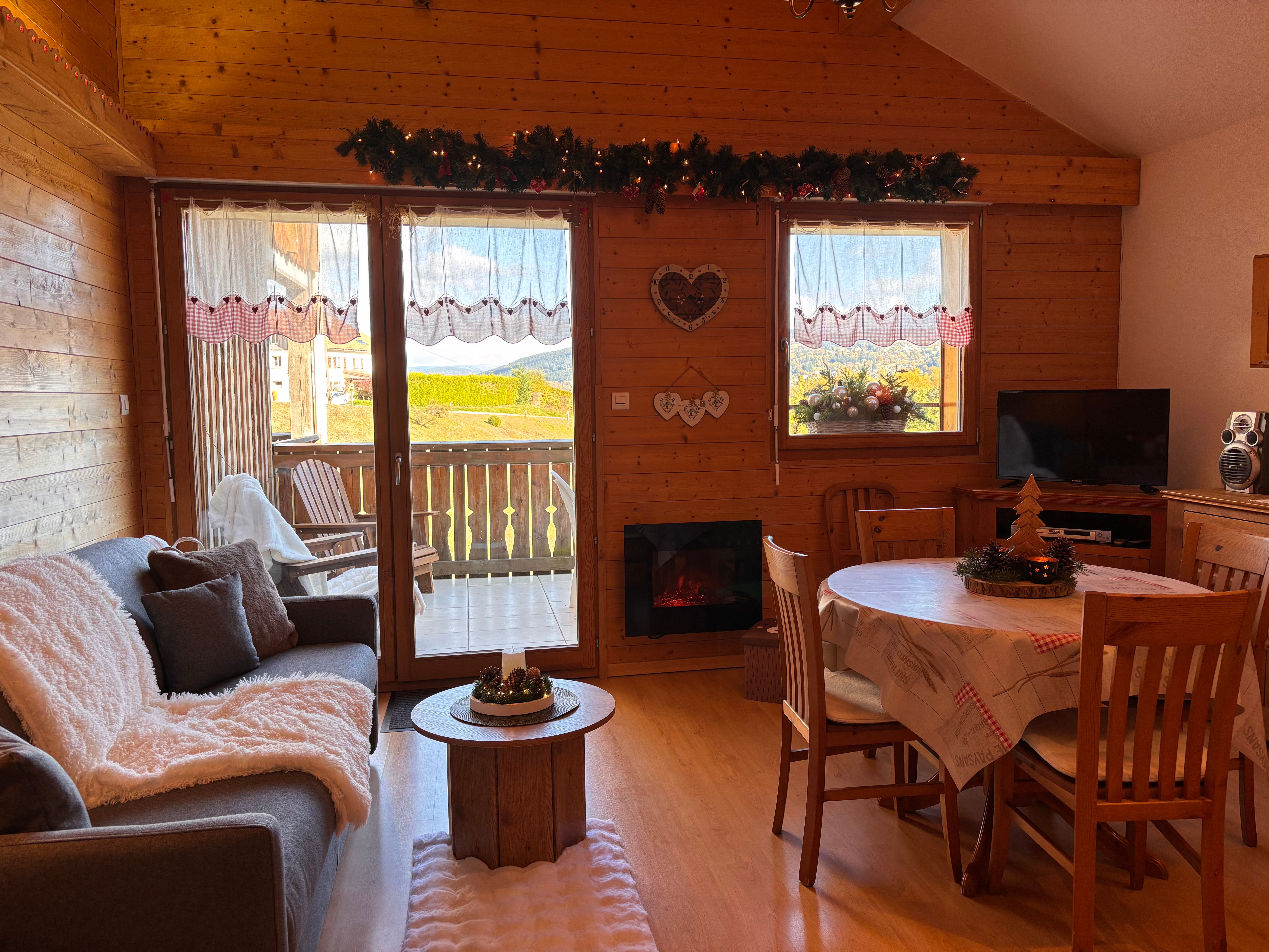 Salon - séjour - Appartement "Coup de Cœur" à Gérardmer