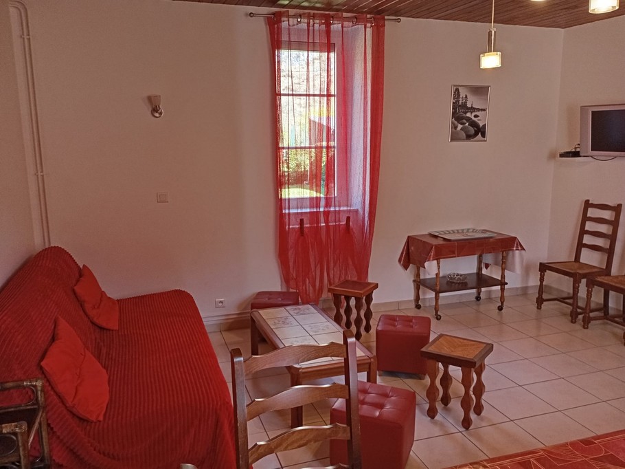 Ground floor, living/dining room with views over the courtyard and behind the mountains and parkland