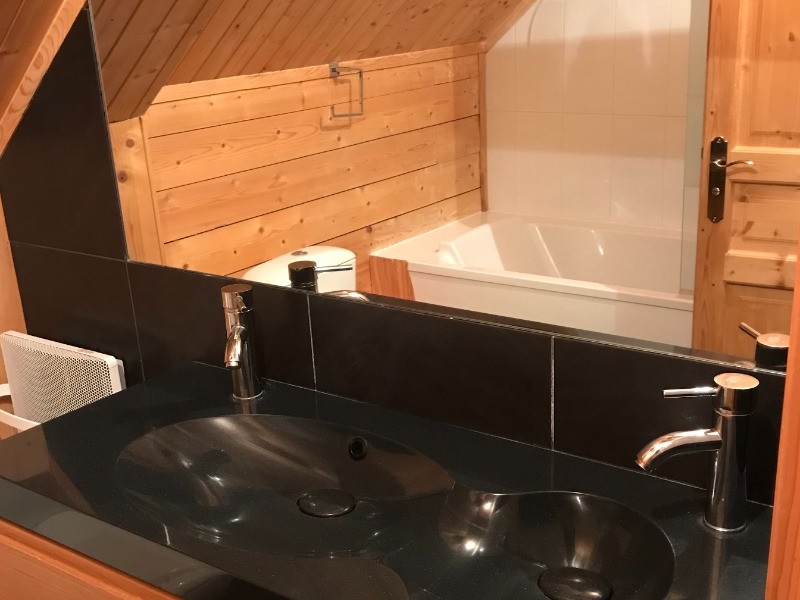 Bathroom + WC and double washbasin upstairs leading to the 3 bedrooms.