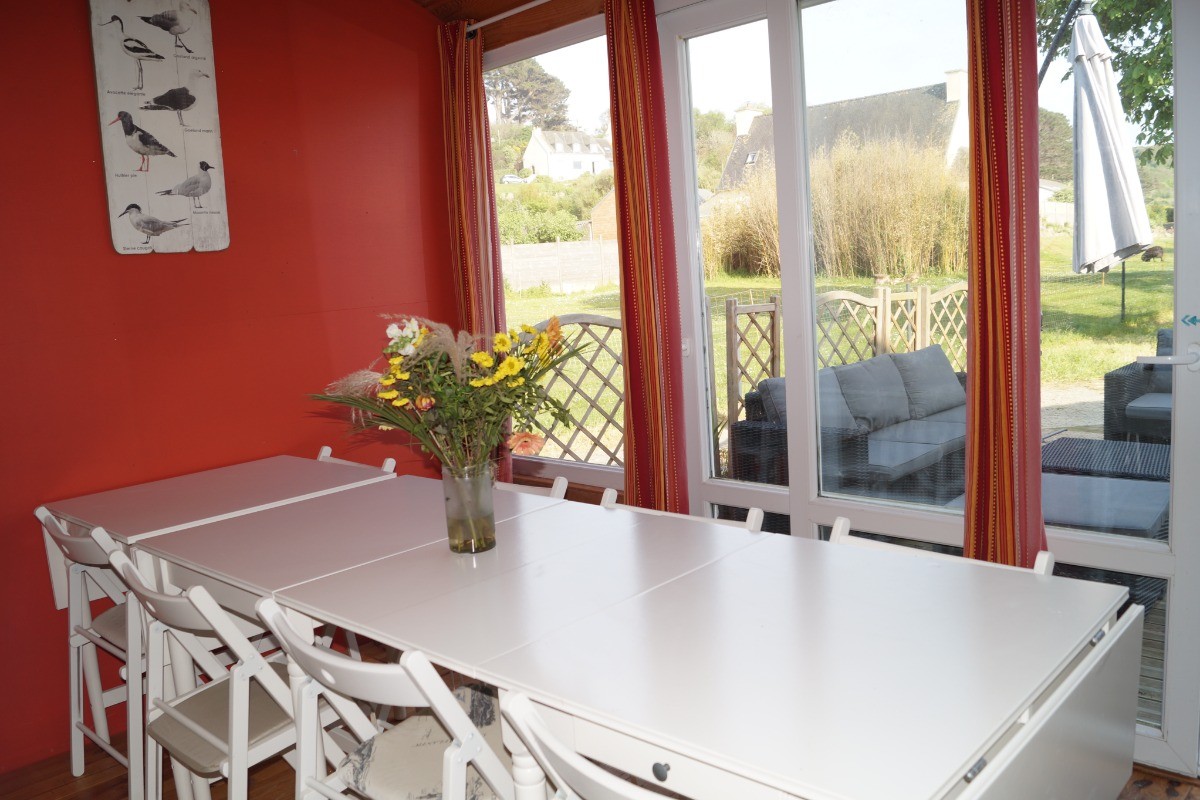 Véranda avec accès terrasse et jardin