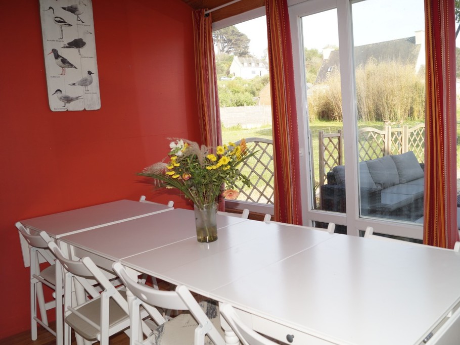 Véranda avec accès terrasse et jardin