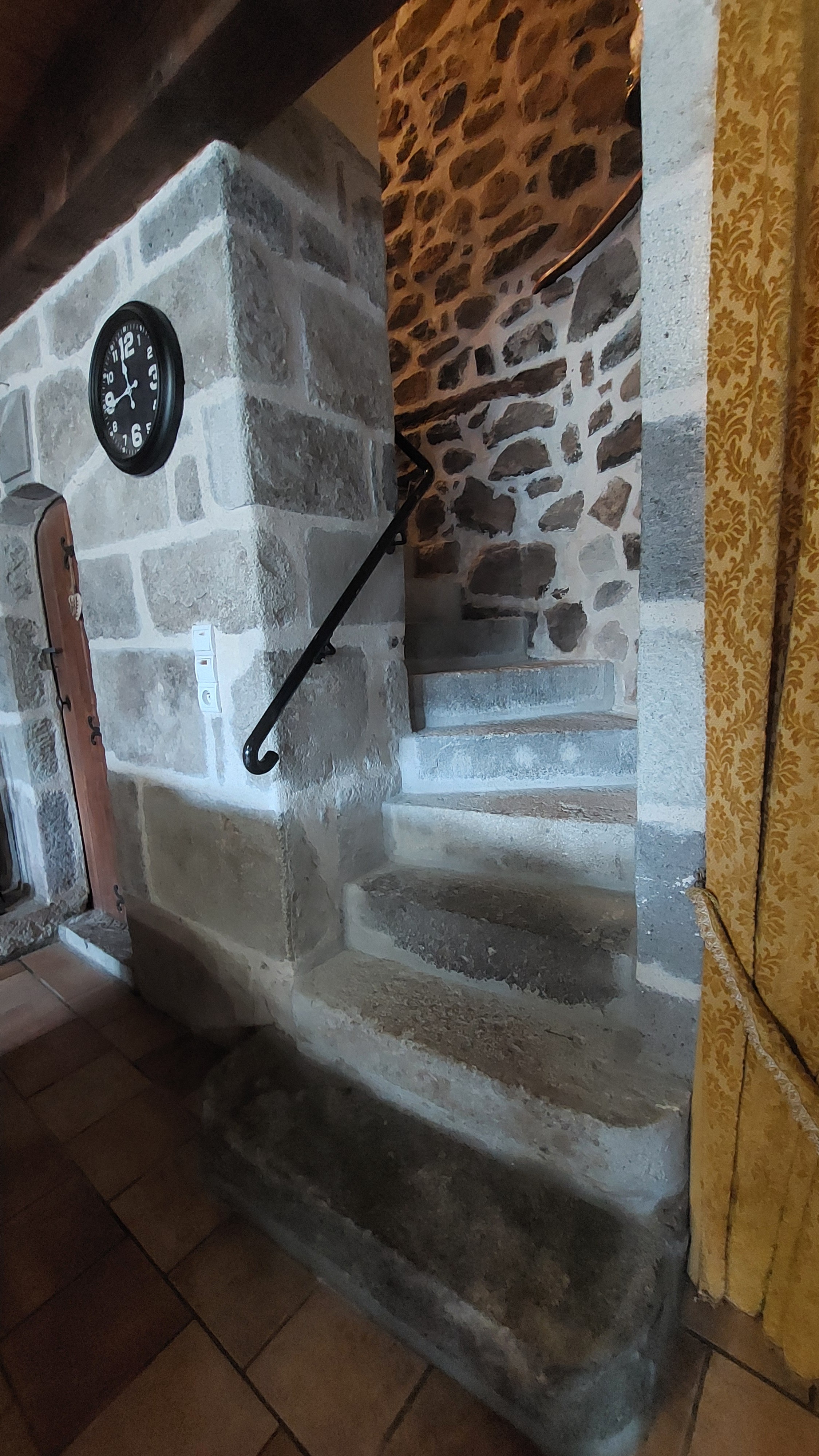 Old stone staircase in a typical Cantal gîte