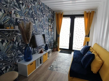 Espace salon - Gîte Timéo Container Maritime à Bains-les-Bains