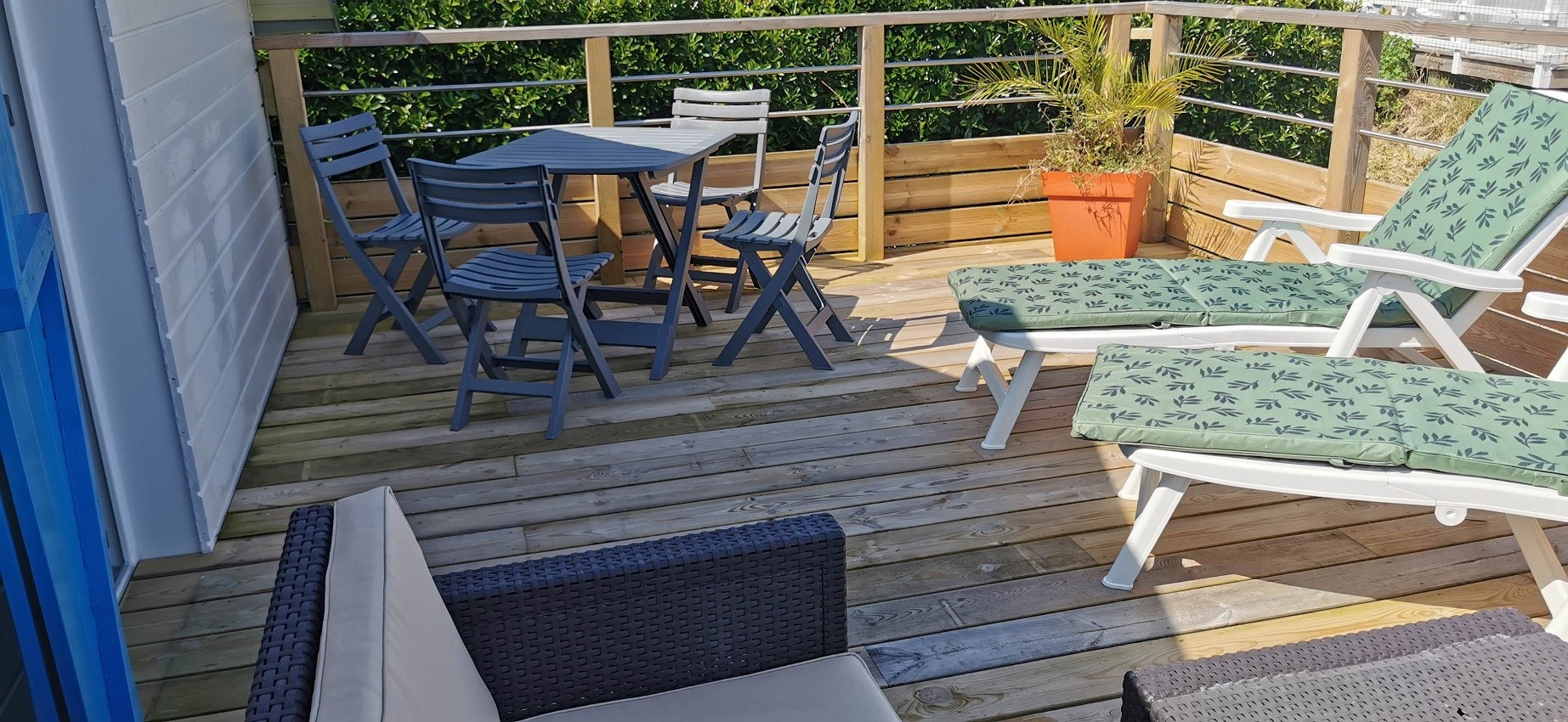Covered terrace with garden furniture