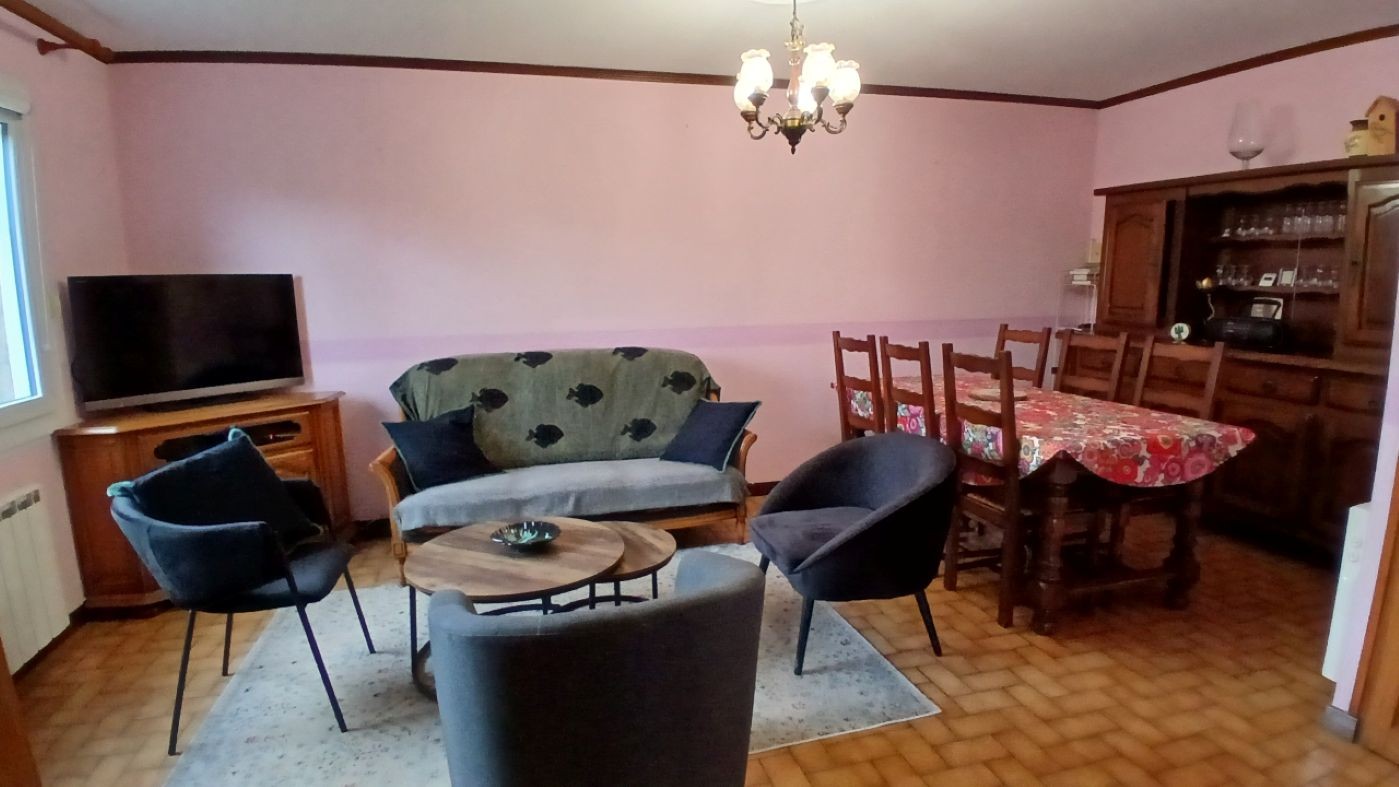 séjour réunissant salon et salle à manger