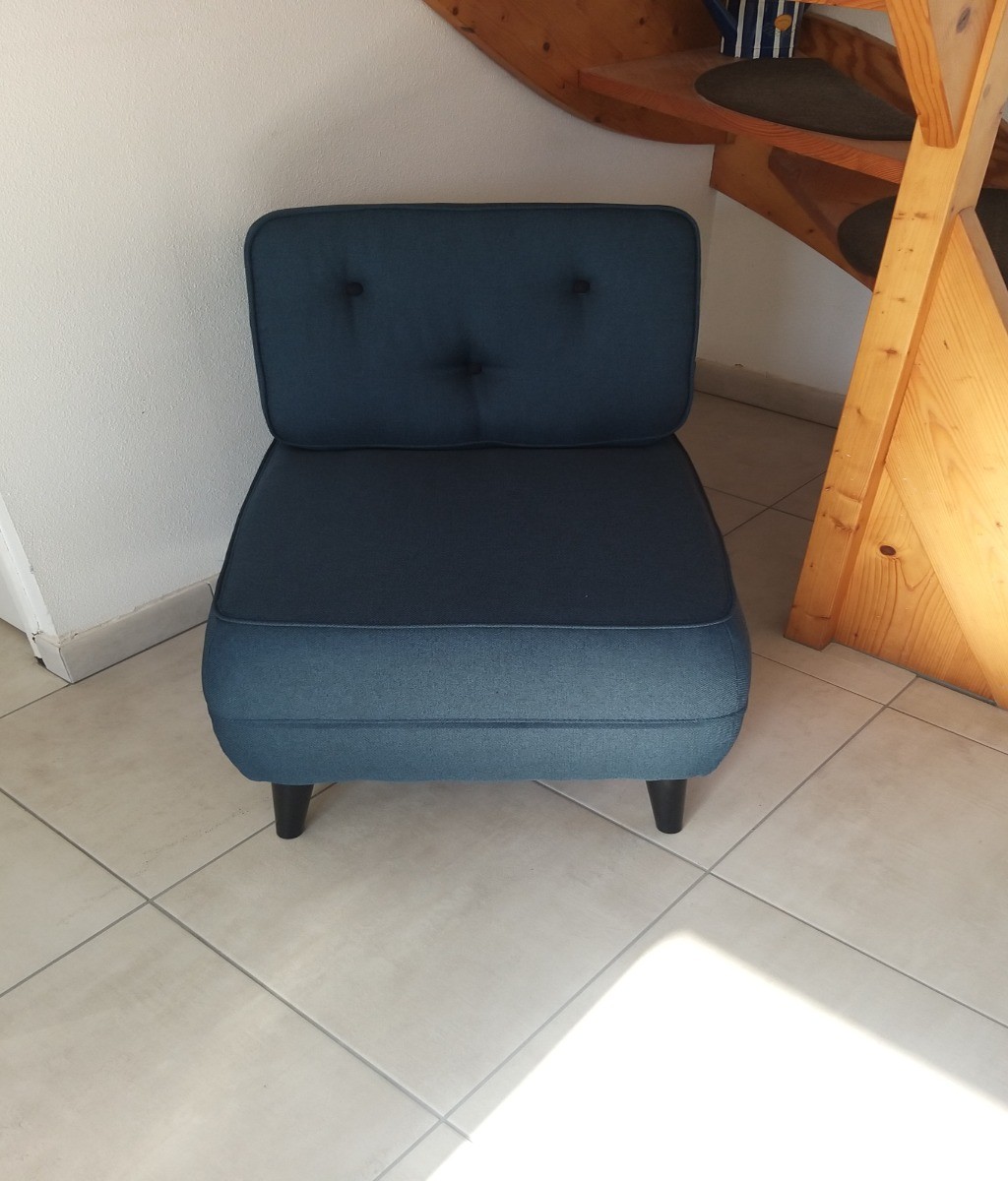 Un des deux fauteuils
