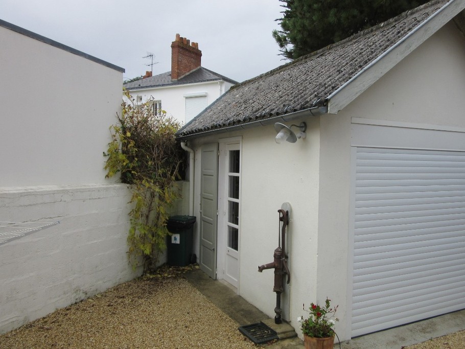 Garage avec lavabo pour les retours de pêche et four