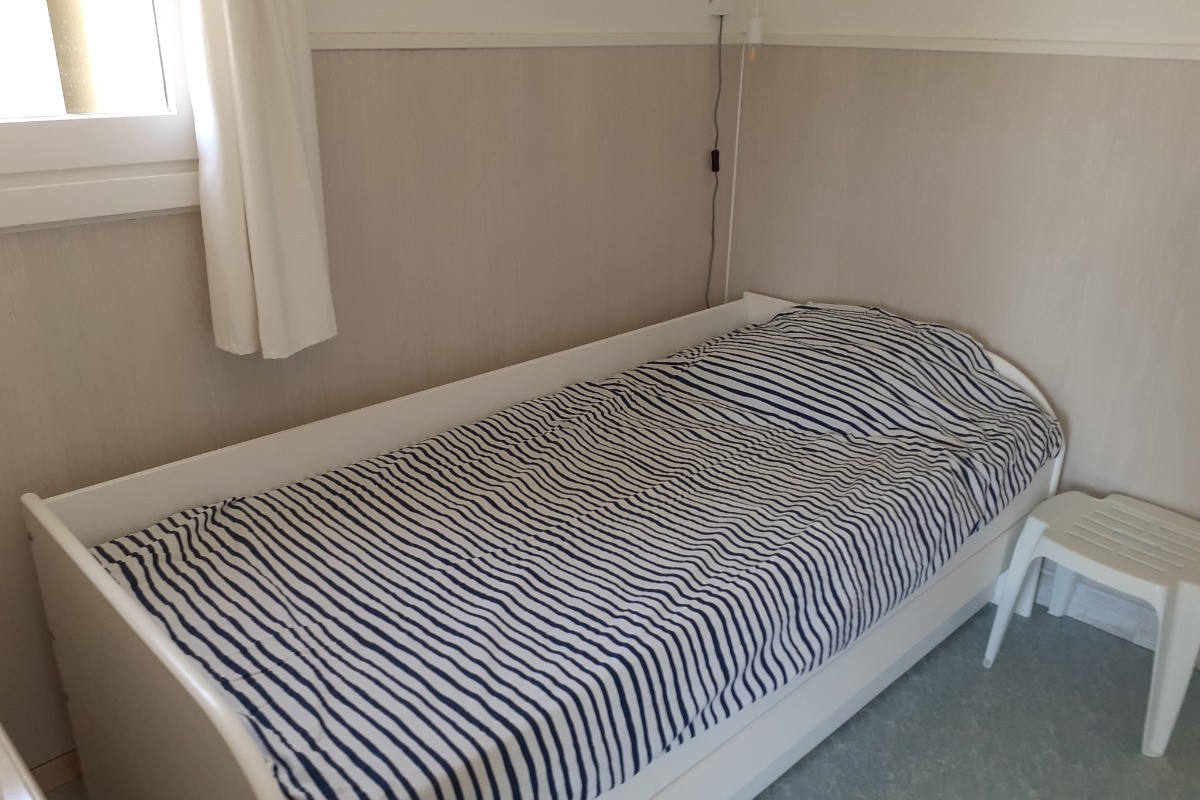 Chambre en bas avec lit gignogne