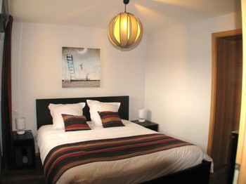 First bedroom with queen-size bed. Rest and comfort