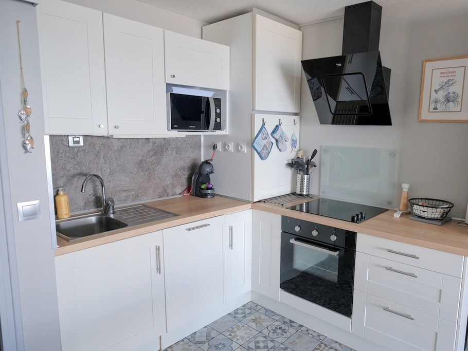 la cuisine ouverte sur la pièce de vie