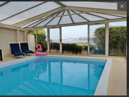 Heated indoor pool with sea view