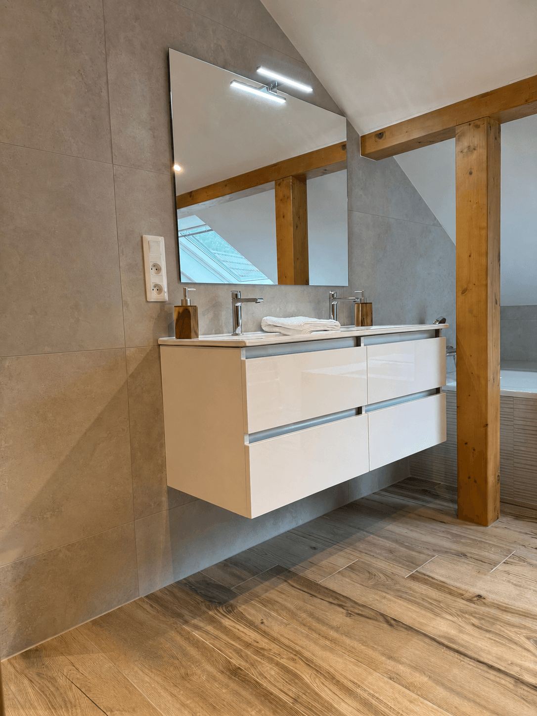 The upstairs bathroom with a shower and bath