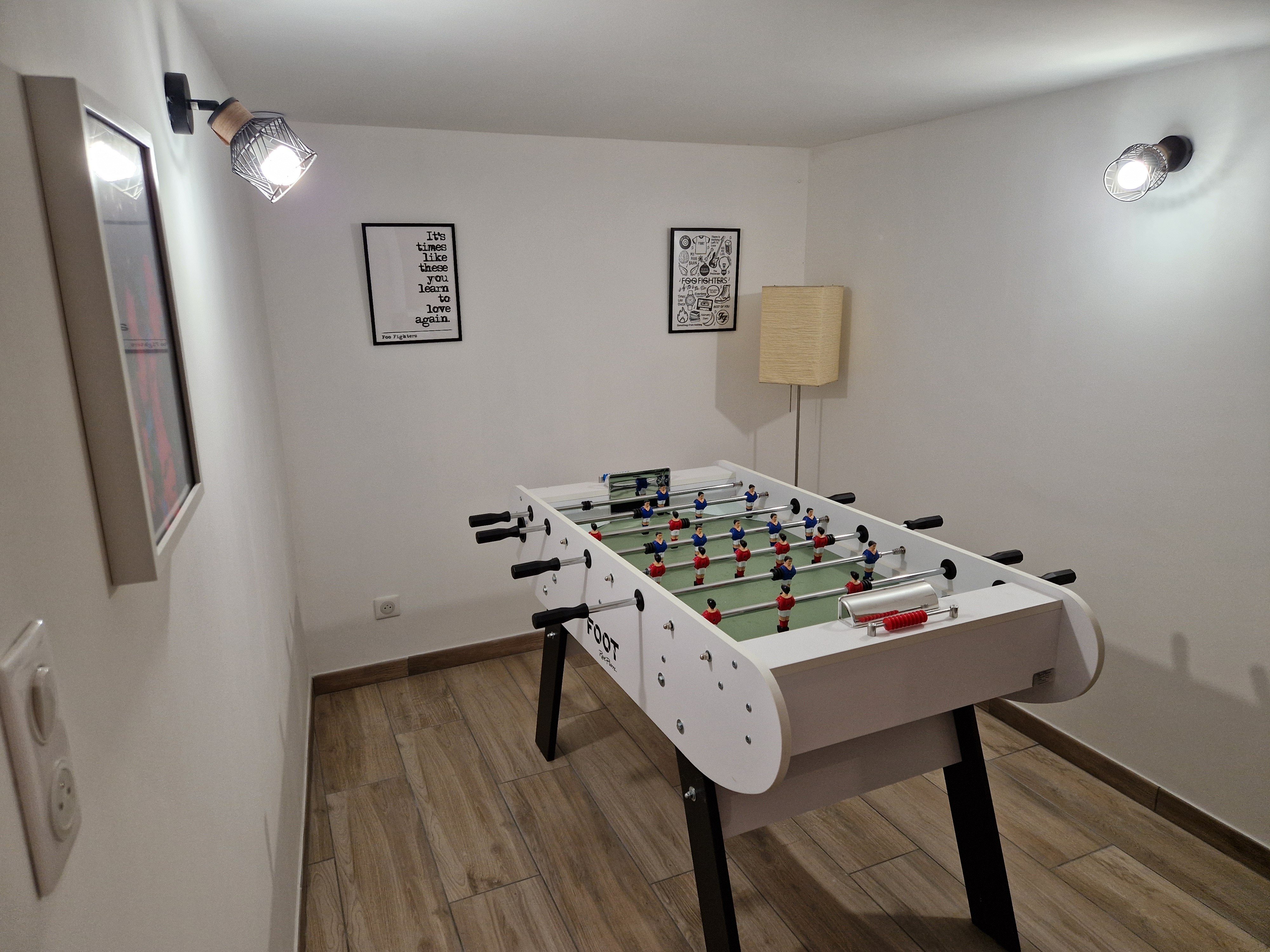 Games room with table football and darts - Gite des Vignes