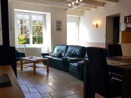 Maison de plain-pied. Grande pièce de vie avec salon et séjour.
Crédits photo : Clévacances Haute Bretagne
