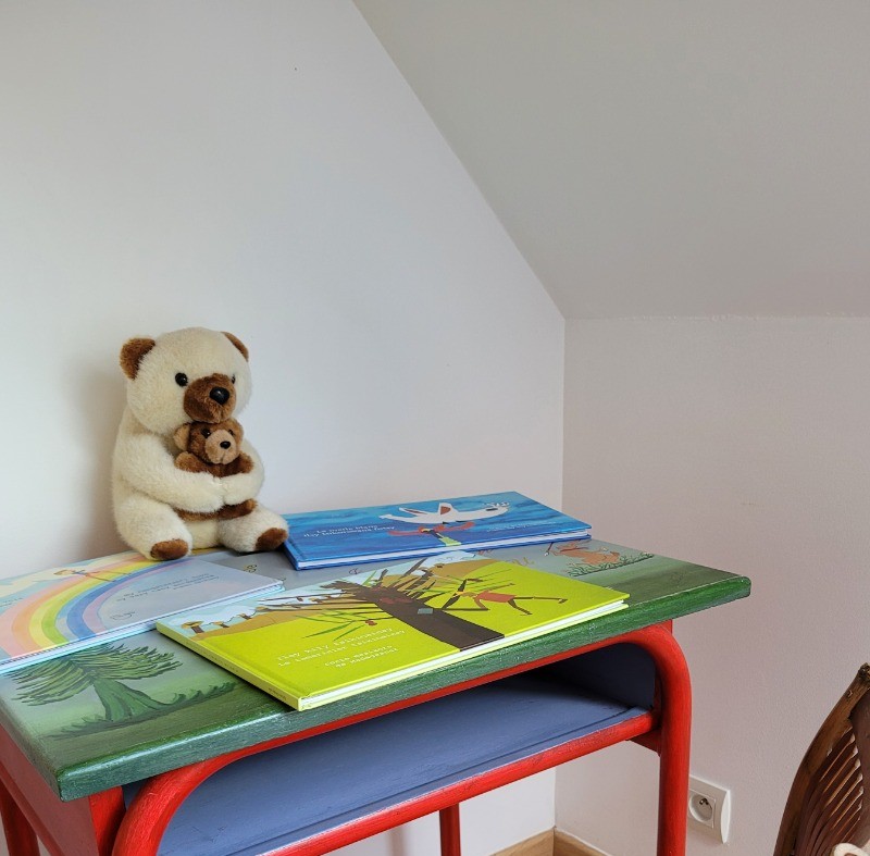 Coin lecture pour les petits - Chambre 3 lits individuels