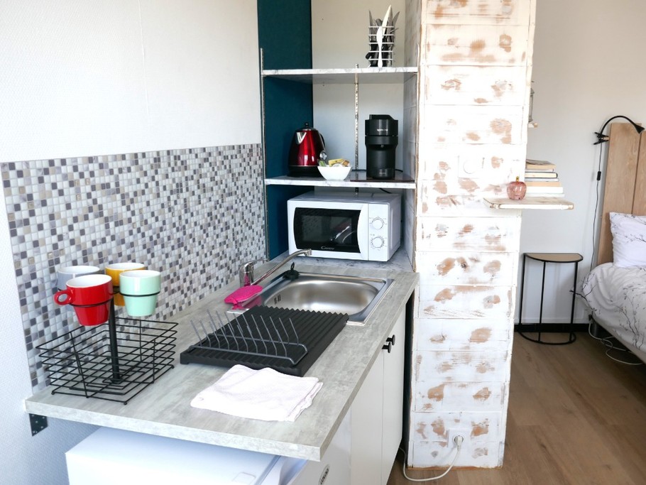 Coin cuisine dans la chambre 1