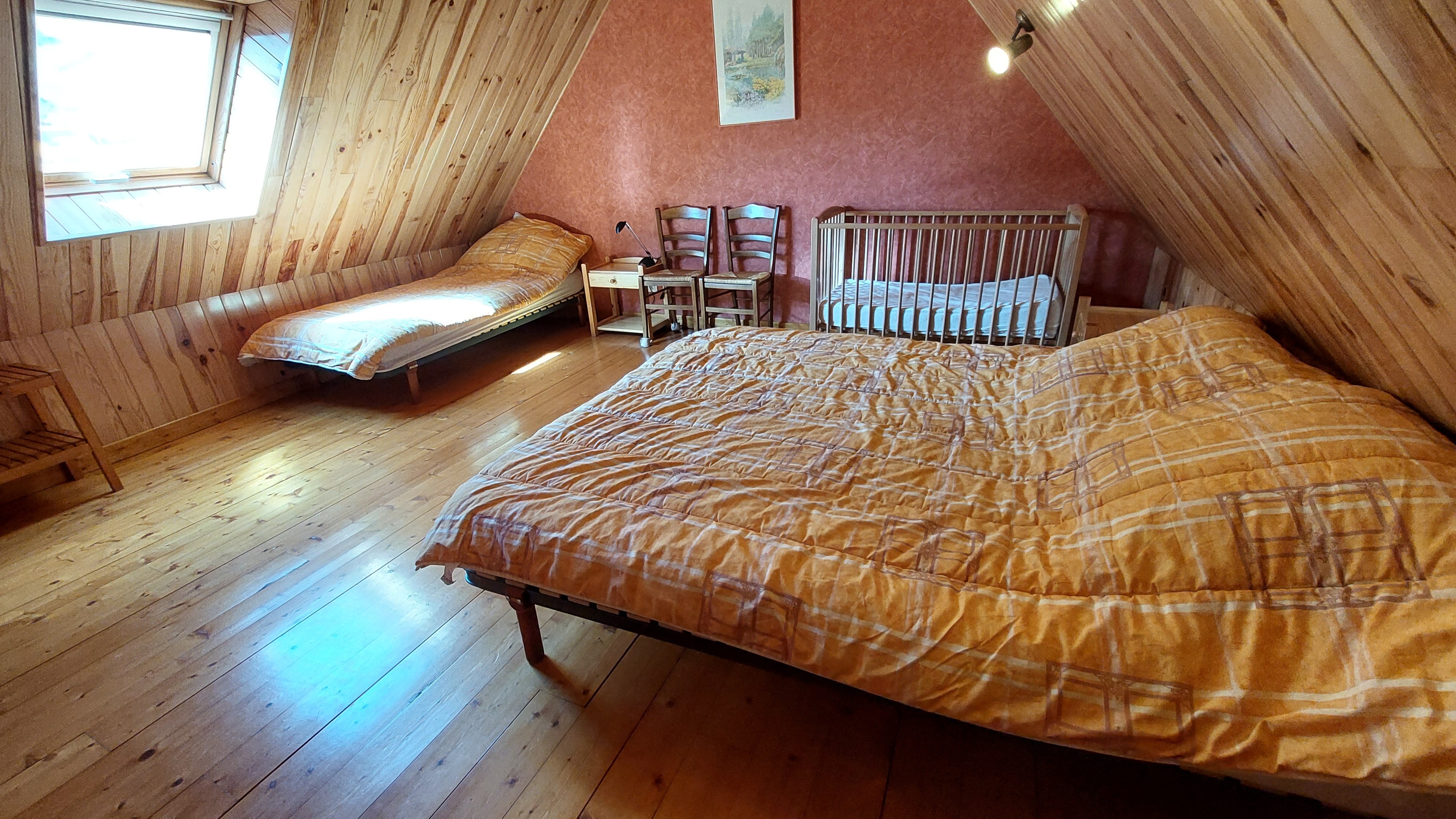 Large upstairs bedroom ideal for a family or group