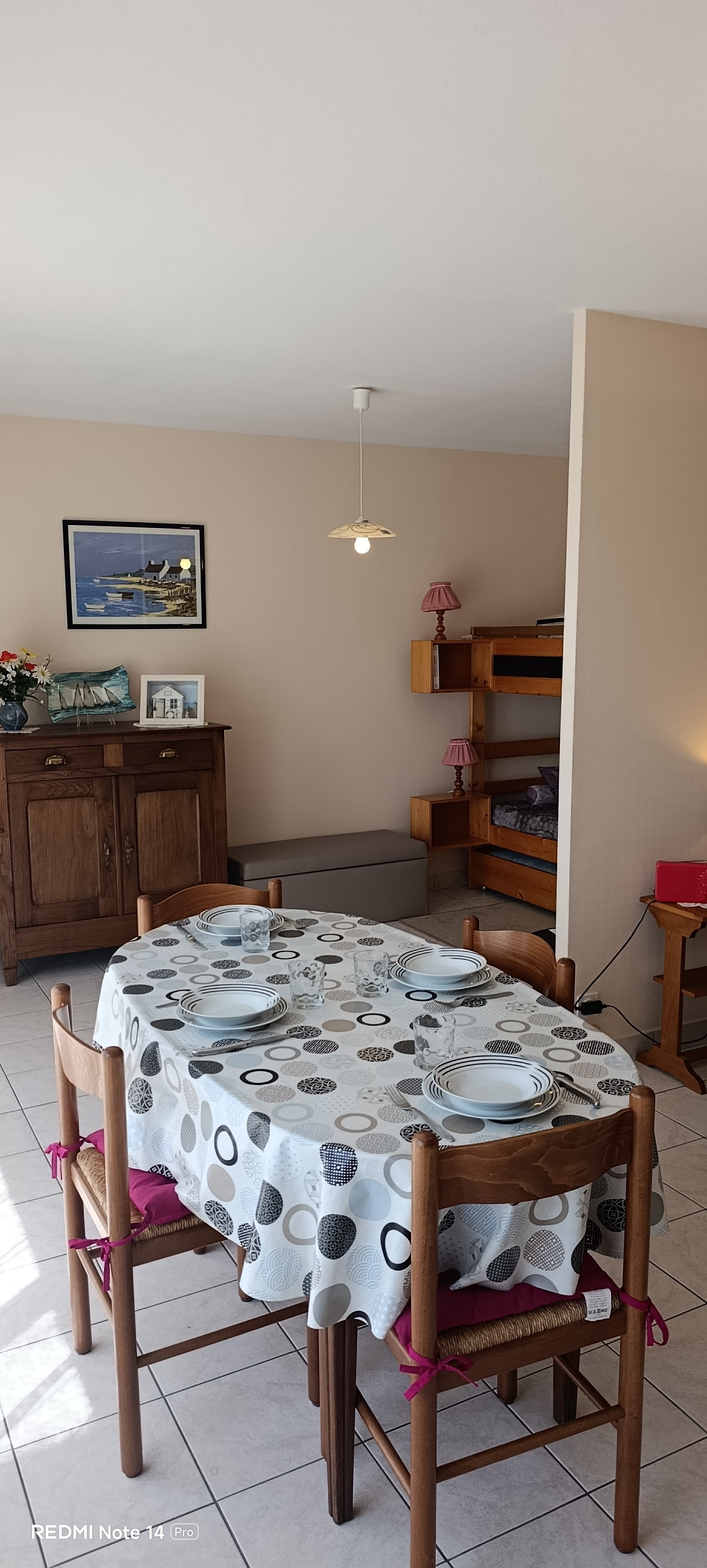 The dining area and kitchen in the living room – “Le Beaulieu” flat