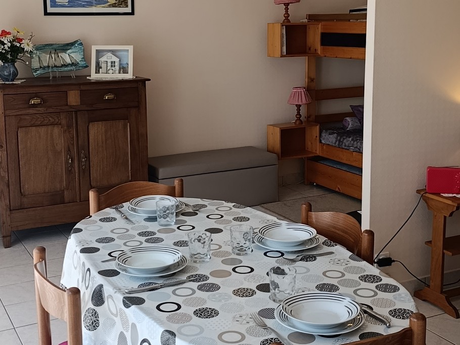 The dining area and kitchen in the living room – “Le Beaulieu” flat