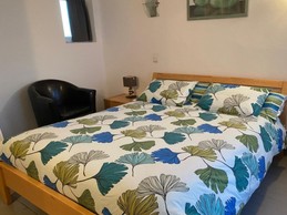 Chambre Tournepierres avec un lit en 160