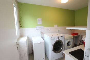 Buanderie commune (lave-linge, sèche-linge)