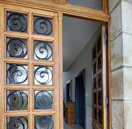 Porte d'entrée chêne et fer forgé