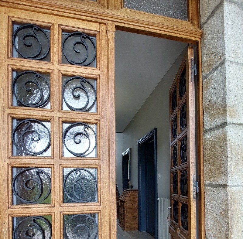 Porte d'entrée chêne et fer forgé