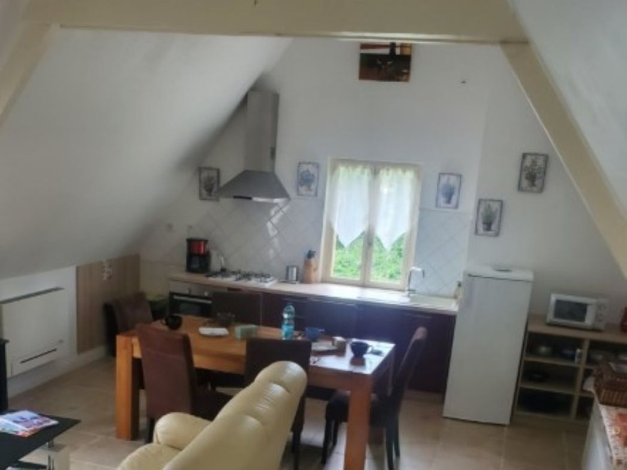 Grand séjour poutres apparentes