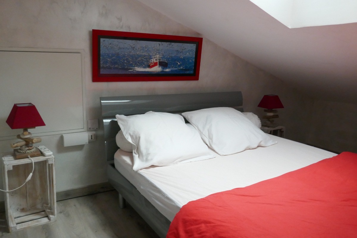 Mezzanine avec un lit en 140