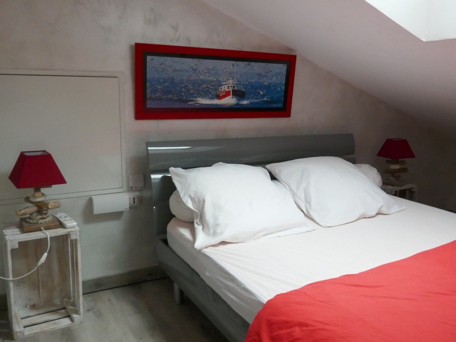 Mezzanine avec un lit en 140