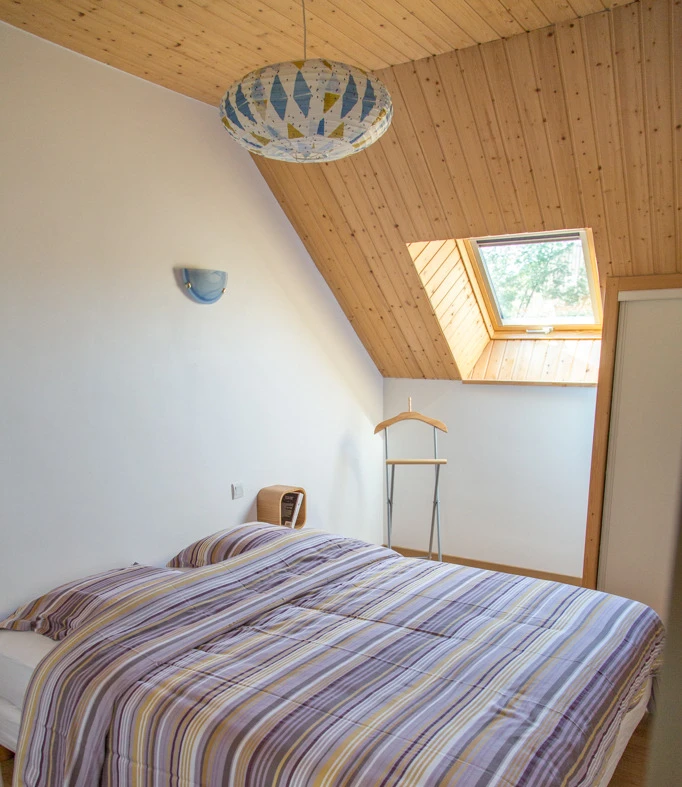 Chambre lit double à l'étage