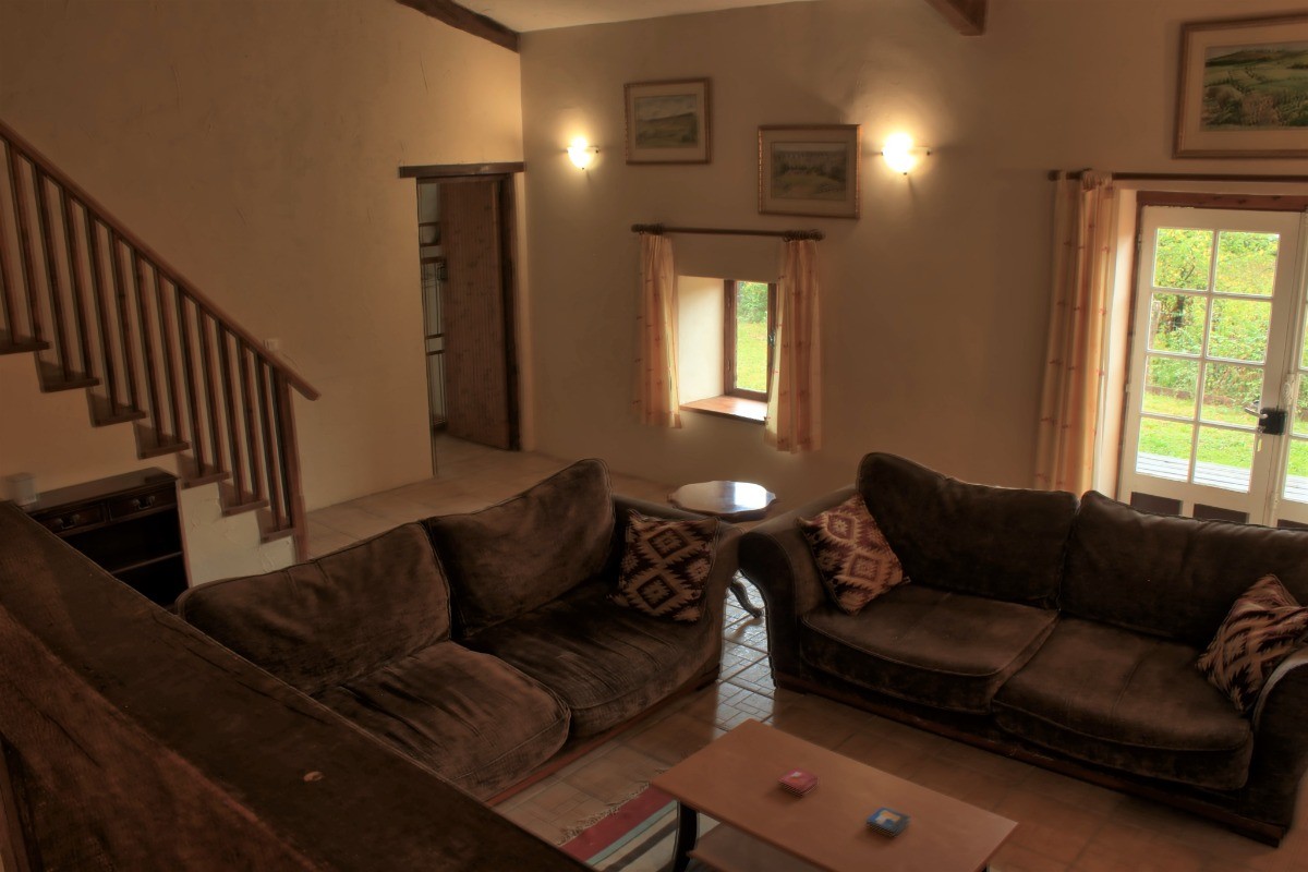 Belle hauteur sous plafond dans cet ancien corps de ferme entièrement rénové