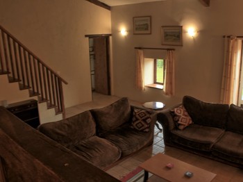 Belle hauteur sous plafond dans cet ancien corps de ferme entièrement rénové