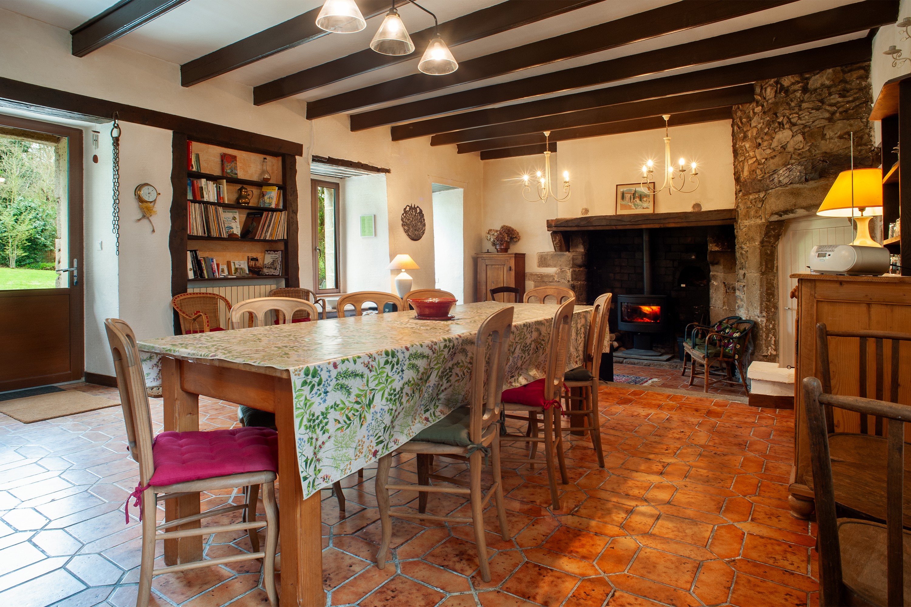 The dining room table (seats 8 to 10) in the living room on the ground floor