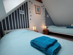 Chambre avec 2 lits simples