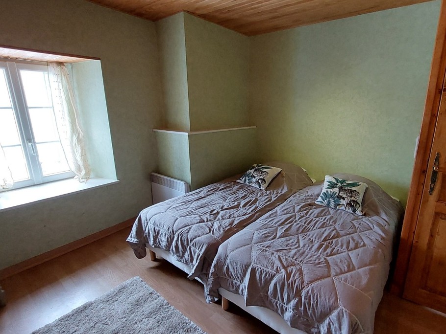 Chambre avec 2 lits simple