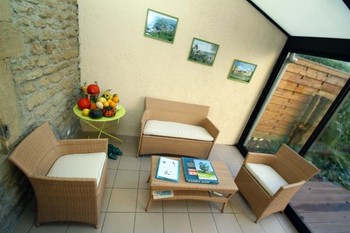 Salon véranda - Chambre d'hôtes l'An XII - Orchidées