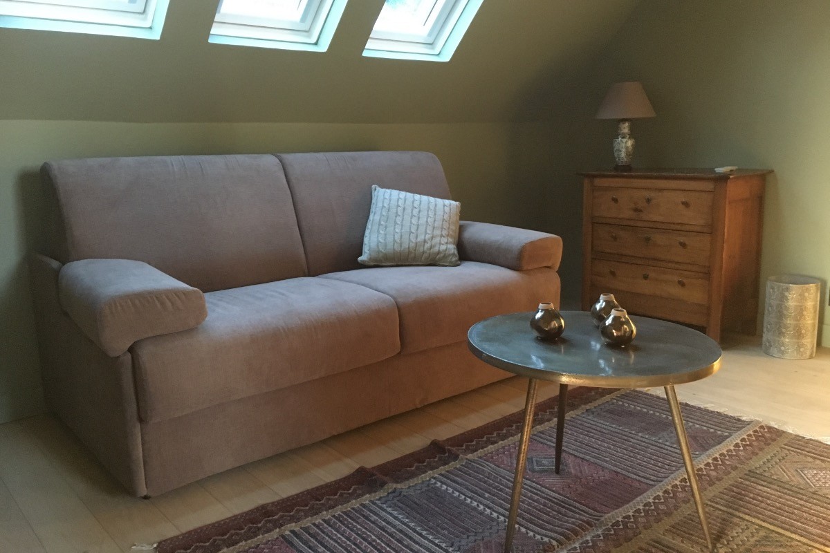 Suite Mélisse - salon avec canapé-lit