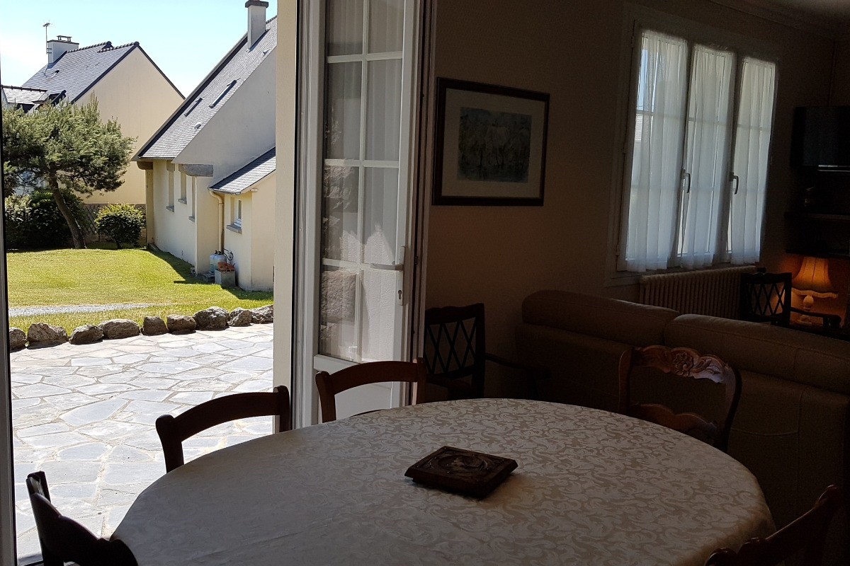 L'accès depuis la salle à manger sur la terrasse