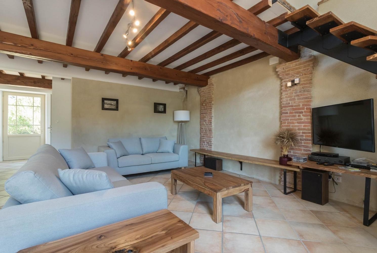 Living room with TV, DVD player and hi-fi system