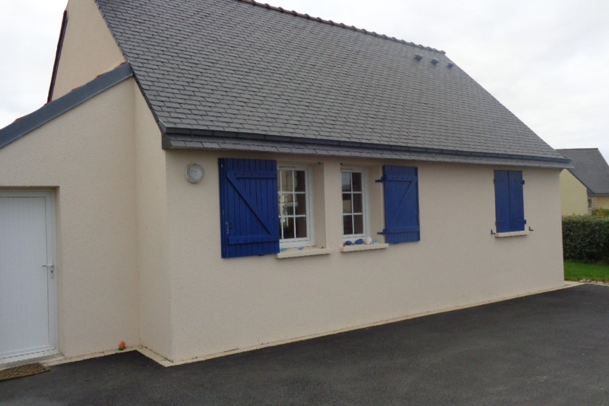 Arrière de la maison Parking