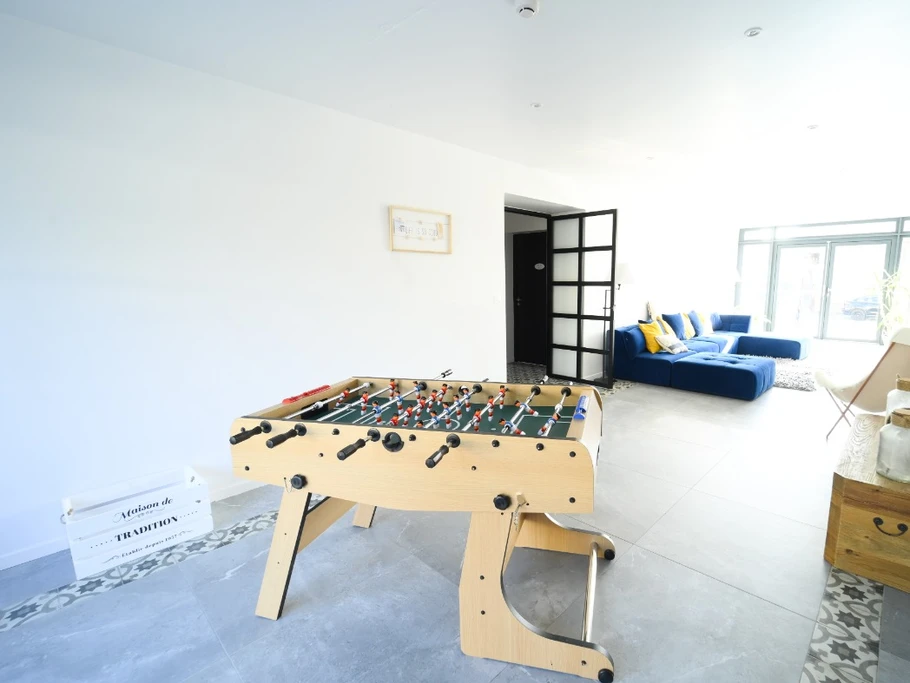 La salle de jeu et son coin détente