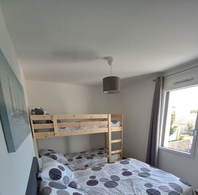 Bedroom 2 with a 140cm bed and two 90cm bunk beds