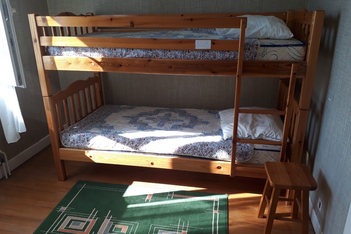 La chambre équipée de 2 lits