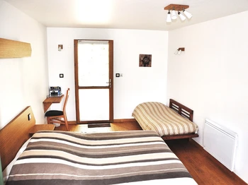 la chambre Banc de sable avec Futon déplié
