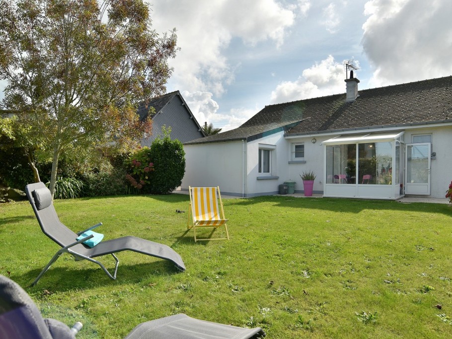 Jardin clôturé et arboré