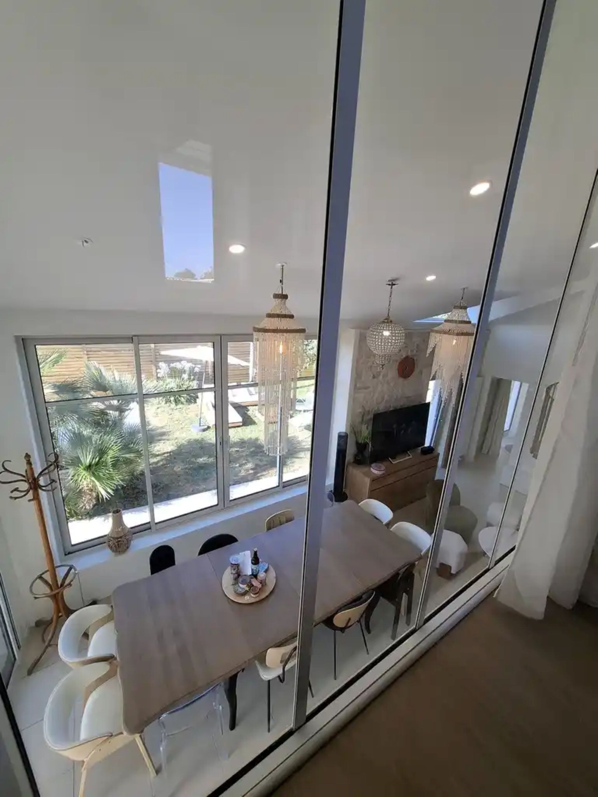 view of the glass roof in one of the bedrooms with blackout curtains