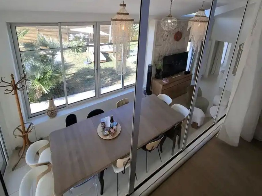view of the glass roof in one of the bedrooms with blackout curtains
